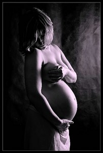 Pregnant Woman In Light And Shadow 