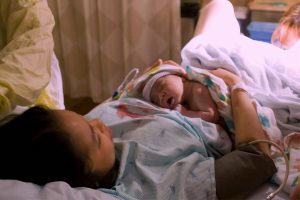 New Mom Holding Baby.